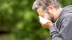 Is Sneezing a Symptom of COVID?