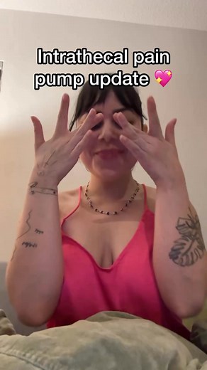 Intrathecal pain pump update 💖 it's been such a long and tumultuous journey. I can't believe I'm finally close to the finish line 🥹🫶Video Description: Samantha is seen in her room wearing a pink night gown with her hair up into a bun. She's wearing long magnetic eyelashes with an otherwise bare face. She's happy. #ChronicPainAwareness #IntrathecalPainPump #IntractablePain #PainReliefJourney | A Disabled Icon