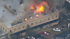 Crews work into the night to put out 3-alarm fire at historic building in Auburn