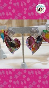 Make earrings from a milk jug! Wash your empty milk jug and cut out shapes. I used alcohol inks and then coded them with resin and they came out so pretty! Does this make you want to save your milk jugs? #milkjug #recyclingideas | Crafty Chica by Kathy Cano-Murillo