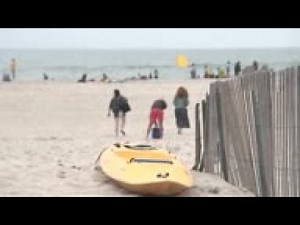 Police enforce social distancing at NY beach