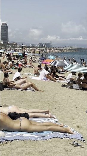 🇪🇸 Sun bath at Barcelona beach