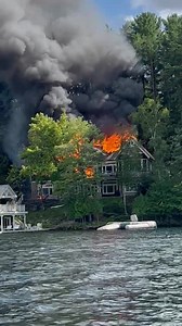 In case you missed it from Monday. Video Credit Jamie Erlick A few minutes past 4 pm on Monday firefighters were called to a report of a structure on fire on Muskoka Road 118. Multiple callers stated they could see the roof on fire of a large 2 storey cottage, ember blast was spreading into the nearby vegetation. Members from Foots Bay, Port Carling, Minett and Bala Stations attended the scene with 2 pumpers, 4 tankers, and 2 fire boats. Upon arrival members reported a fully involved cottage wit