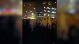 WATCH: Workers at Foxconn Technology’s plant in China that produces Apple’s iPhones clash with white-clad guards.