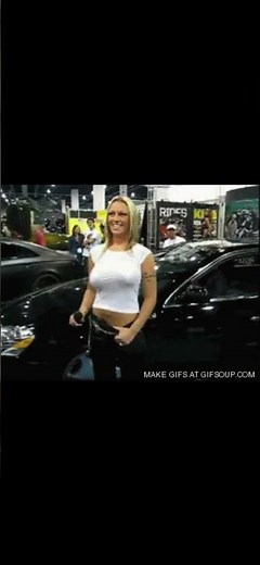 Blonde woman flexing her beautiful boobs at a car show #blonde #boobs #hot #sexy