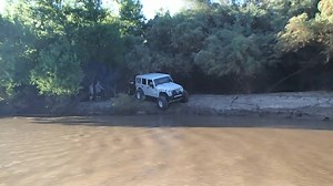 The tow dolly stuck in the mud. | Wild West Off-Road Recovery