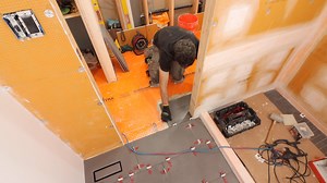 Notching tile floors in doorways...if you're remodeling a bathroom and need help, join our Platinum Membership and make your project easier at https://homerepairtutor.com/platinum-membership/ | Home Repair Tutor