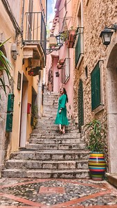 As soon as we stepped foot in Taormina, it was love at first sight! This Italian city is located on the beautiful island of Sicily feels like it belongs in a fairytale. It is perched high on Mount Tauro overlooking the ocean and has been nicknamed “The Pearl of the Ionian Sea”. Here are a few places you don’t want to miss in Taormina: {SAVE for future trip planning} •The Greek Theater of Taormina: Visit the ancient ruins of this Greek and Roman theater that date back to the 3rd century BC. It is