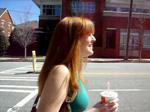 The Tight Swim Suit Redhead Girl walking to the Parade
