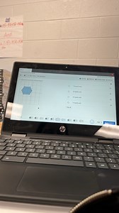 What is the area of the composite figure? The figure is a hexag... | Filo