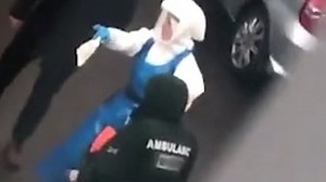 Paramedics appear with person in hazmat suit amid coronavirus fears