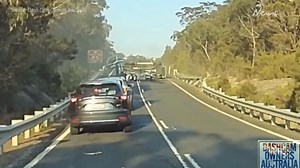 Driver slammed after failed high speed takeover ends in brutal crash