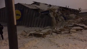 VIDEO: Two Garda guarding the scene where the Fortunestown Lane Lidl in Jobstown was torn down by vandals with a JCB, may have been stolen from nearby building site where housing is being constructed. #LIDL #tallaght #dublin #StormEmma #BeastFromTheEast | Dublin Page
