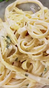 Homemade Alfredo Sauce Without Heavy Cream >>>https://pickyeaterblog.com/classic-alfredo-sauce-without-heavy-cream/ This classic alfredo sauce without heavy cream is delicious with your favorite pasta! Made with parmesan cheese, black pepper, skim milk, and garlic powder, you will want to prepare this creamy sauce the next time you make fettuccine alfredo. I promise, this is the best homemade alfredo sauce recipe you’ll ever try – it’s total comfort food, is gluten free, and can easily be made v