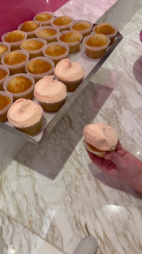 Creating a swirl of sweetness with our bestselling Pink Vanilla Cupcakes featuring the iconic Hummingbird Swirl! 🎀🧁 Visit your nearest bakery to pick up an impromptu sweet treat, or order online ahead of celebrations for London delivery or collection | The Hummingbird Bakery