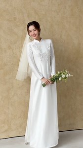 33K views · 302 reactions | Áo dài satin cao cấp đính kết Hoa Linh Lan mang đến vẻ đẹp thanh lịch, dịu dàng nhưng vẫn nổi bật trong ngày trọng đại. #aodaicuoicaocap #BaoNyNguyenBridal | Bao Ny Nguyen Bridal | Facebook