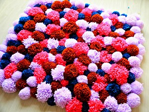 Make Your Own DIY Pom Pom Rug