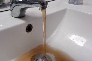 BROWN WATER: Has the water in your home gone brown recently? This was from a home in Tiwi yesterday whose residents are finding it impossible to wash clothes or take showers. | ABC Darwin