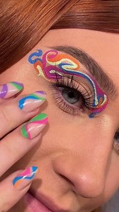 1.9K views · 14 reactions | Using stick on nails on top of my BIAB nail art to get a temporary design change that i can match my makeup and eyeli. #followformore #graphicliner #graphicmakeup #makeup #makeupidea #Eyeliner #eyeshadow #eyebrows #linertutorial #glitter #tutorial #makeuptutorial #makeupartist #art #artist #fyp #foryou #foryoupage #cute #beauty #cosplay #funny #comedy #couple #nails | Iredefh | Facebook