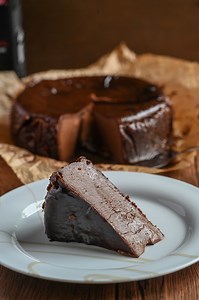 Ready for a slice of heaven? Try our Chocolate Basque Cheesecake recipe! 🍫🍰 recipe below 👇 Chocolate Basque Cheesecake Ingredients: - 150g DLA Santo Tomas 70% Dark Chocolate Couverture - 15g Cocoa powder - 400g Cream cheese - 100g Powdered sugar - 400ml Fresh cream - 4 eggs - 1 egg yolk Preparation: - Bring the cream cheese to room temperature. - Melt DLA Santo Tomas using a water bath. - Line the molder with parchment paper. - Preheat the oven to 240°C Method: 1. Put softened cream cheese in