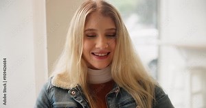 Woman, smile and phone in cafe for reading comic strip, communication and internet scroll for meme. Female person, happy laugh and mobile typing for message notification, online gif and funny comment