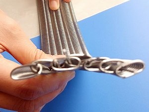 [Hot Item] Guangdong Factory Stainless Steel Conveyor Belt with Chain Link Edge