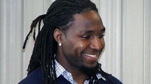 Robinson gives to Texans YMCA