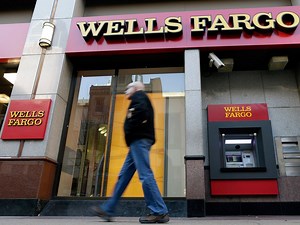 Wells Fargo fired 5,300 workers for improper sales push. The executive in charge is retiring with $125 million