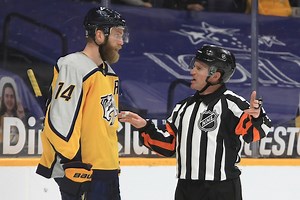 NHL ref gets caught on a SCORCHING hot mic sounding proud of handing out a penalty