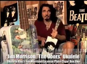 1.2K views · 22 reactions | LIGHT MY FIRE: Jim Morrison Cigar Box Uke! Ukulele Ray tries out his newest creation, a Jim Morrison "The Doors" License Plate Cigar Box Ukulele, the perfect companion to his earlier creation of The Doors Lunchbox-A-Lele in 2006! Come on baby, light my FIRE! | Ukulele Ray | Facebook