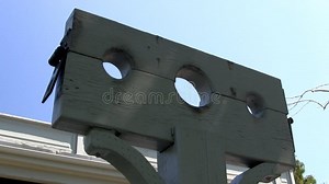 Stock pillory torture stock footage. Video of physical - 347572568