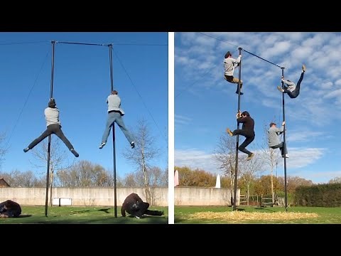 Talented Acrobats Performs Choreography On Chinese Poles