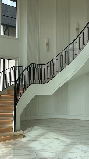 Grace in every curve. ✨ This month is all about the artistry of custom curved stairs. #homedesign #interiordesign #luxuryhomes #architecture #customhomes #stairdesign #moderndesign #stairexperts #stairs #customstairs | Southern Staircase