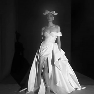 18 reactions | This #ZuhairMurad princess wedding dress crafted in mikado featuring a beautiful draped bodice that accentuates the feminine curves with a slit and attached overskirt! https://bit.ly/3o2XWbo | Designer Bridal Room, Hong Kong | Facebook