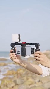 This portable smartphone video rig will help make sure you never miss a moment while recording with your phone! #neewer #vlog #phonephotography #video #videography #photo #photography #phonerig #volgging #contentcreationtips #intagood #photographytricks | Neewer