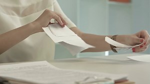 Woman Tearing Paper Stock Footage SBV-304387258 - Storyblocks