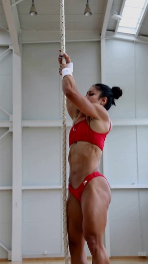 Master Your Strength and Balance: Gymnast-Inspired Full Body Routine This workout focuses on building the exceptional upper body strength, core stability, leg power, and flexibility necessary for advanced balance moves like one-arm rope holds. Workout Title: Gymnastics Strength & Balance Builder 1. One-Arm Handstand Hold (against wall) Sets: 3 Time: 15-30 seconds each arm Focus on engaging shoulders and core while maintaining a steady handstand position. 2. Hanging Leg Raises on Vertical Rope or