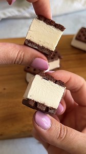 ICE CREAM SANDWICH BONBONS⁣ 🍦🍫 ⁣ Follow along with @thebreadlessbrunette to turn our vanilla ice cream sandwiches into the perfect spring treat! ⁣ Ingredients:⁣ • 1 box Jolly Llama Vanilla Sandwiches⁣ • 1 cup dairy-free chocolate chips⁣ • 1 tbsp coconut oil⁣ • Flakey sea salt (optional)⁣ ⁣ 1. Add parchment paper to a baking sheet and set aside.⁣ 2. Cut each ice cream sandwich in fourths to make bite-sized squares.⁣ 3. Combine the chocolate chips and coconut oil in a small microwave-safe bowl a