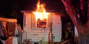 ‘Cluttered’ house in NE Portland burns; Smoke visible for blocks in night