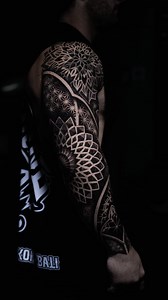 Are you interested in geometric Mandala dot work tattoos? Bloodline offers specialized artists who excel in this unique style. Our team is dedicated to creating intricate and personalized geometric mandala designs. | Bloodline Tattoo Patong Phuket Thailand