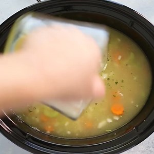 🍲 A big hot bowl of slow cooker chicken noodle soup is the perfect comforting meal on those chilly days! 😋✨ It’s an easy set-it-and-forget recipe with lean white meat, hearty root vegetables, flavorful herbs, and large egg noodles. 🥕🌱🍜 #ComfortFood #SlowCookerRecipes #EasyMealIdeas | Jessica Gavin