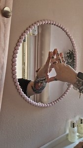 Part 4 of the wet room makeover! ✨ The painted tiles are looking fresh, and we’ve started adding the finishing touches—putting bits up on the wall and sticking the mirror in place. It’s all coming together now! One more part to go... what do you think so far? Video description Kara shows freshly painted white tiles in the shower area she then opens up her paint set and opens the lid of the paint revealing a very pale pink she shows a quick roll of paint over the while wall she then starts adding