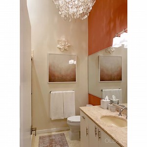 This bathroom was full-on 80s, and first on the chopping block come reno-time. But right now, it’s all about getting the biggest bang for our buck and like I’ve always said, that comes from lighting and color. | Candice Olson Design