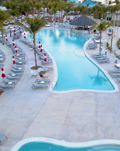 Paradise found. 🌴☀️ Welcome to Bimini Beach Club, Virgin Voyages’ private island escape where soft sand, turquoise water, and laid-back beats create the perfect adults-only day in paradise. 🍹🎶 Lounge by the lagoon, dance under the palms, or sip your way through sunset — the choice is yours. Ready to live the Bimini Beach life? (We've been here and we LOVED it!) 👉 www.funtravelsforall.com #VirginVoyages #BiminiBeachClub #AdultsOnlyCruise #CaribbeanEscape #dreamvacations #funtravelsforall | Al