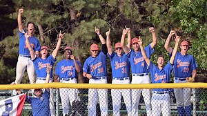 Hyannis Harbor Hawks cheer from the dugout in Cape League Baseball