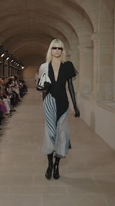 Tactile and inherently feminine. Shop the Ruched Midi Dress now at VictoriaBeckham.com and at 36 Dover Street > https://bit.ly/VB_SS23 | Victoria Beckham