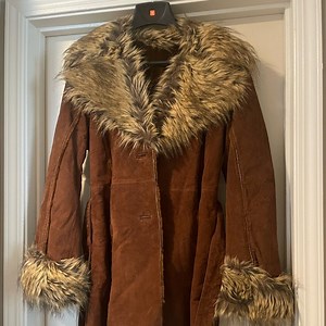 Vintage-inspired faux fur coat in tan and brown hues, Like new, hardly worn.