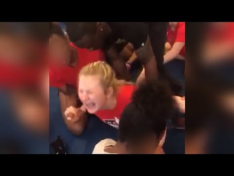 Coach Fired After Video Shows Cheerleader Screaming in Pain During Split