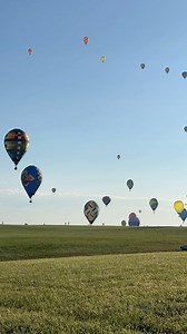 Morning competition flights with 100 hot air balloons at @thenationalballoonclassic in Indianola, Iowa. | Iowa Road Trip