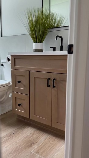 Our #GalaxyTimber cabinets were the perfect choice for this beautiful bathroom. 🎥: @marielalexadesigns #bathroomdesign #bathroomcabinets #bathroominspiration #bathroomideas | Fabuwood Cabinetry